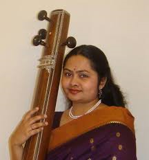 Archana V. Bennur holding a tambura